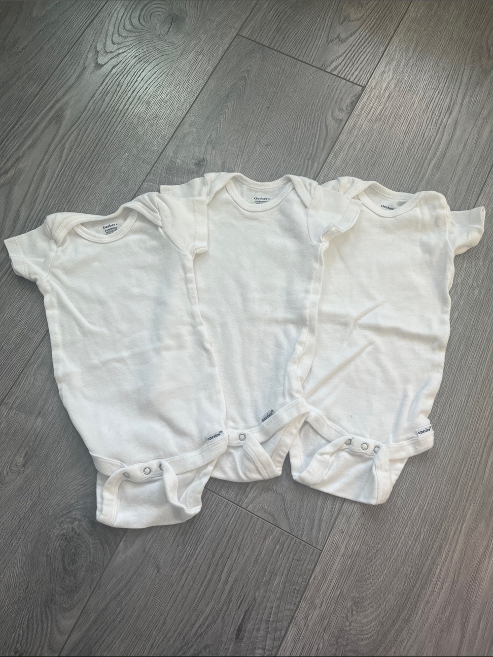 set of 3, 6-9 m white gerber baby onesies